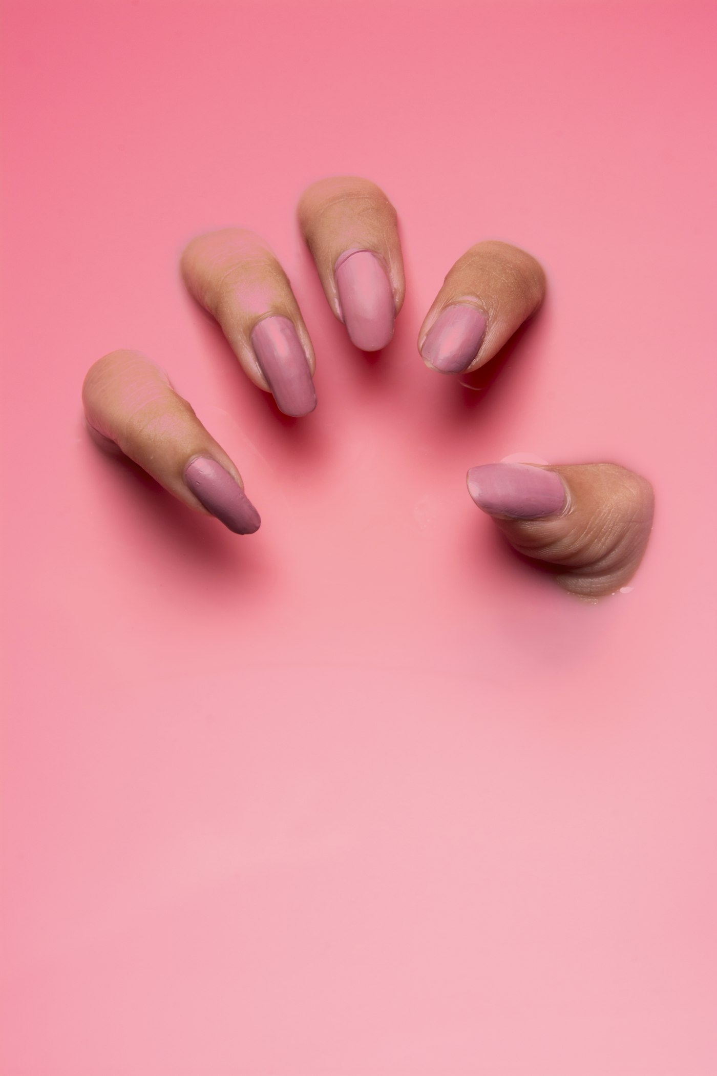 Pink acrylic nails